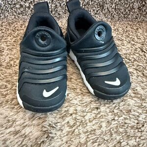 Nike Toddler Black and White Slip-On Sneakers